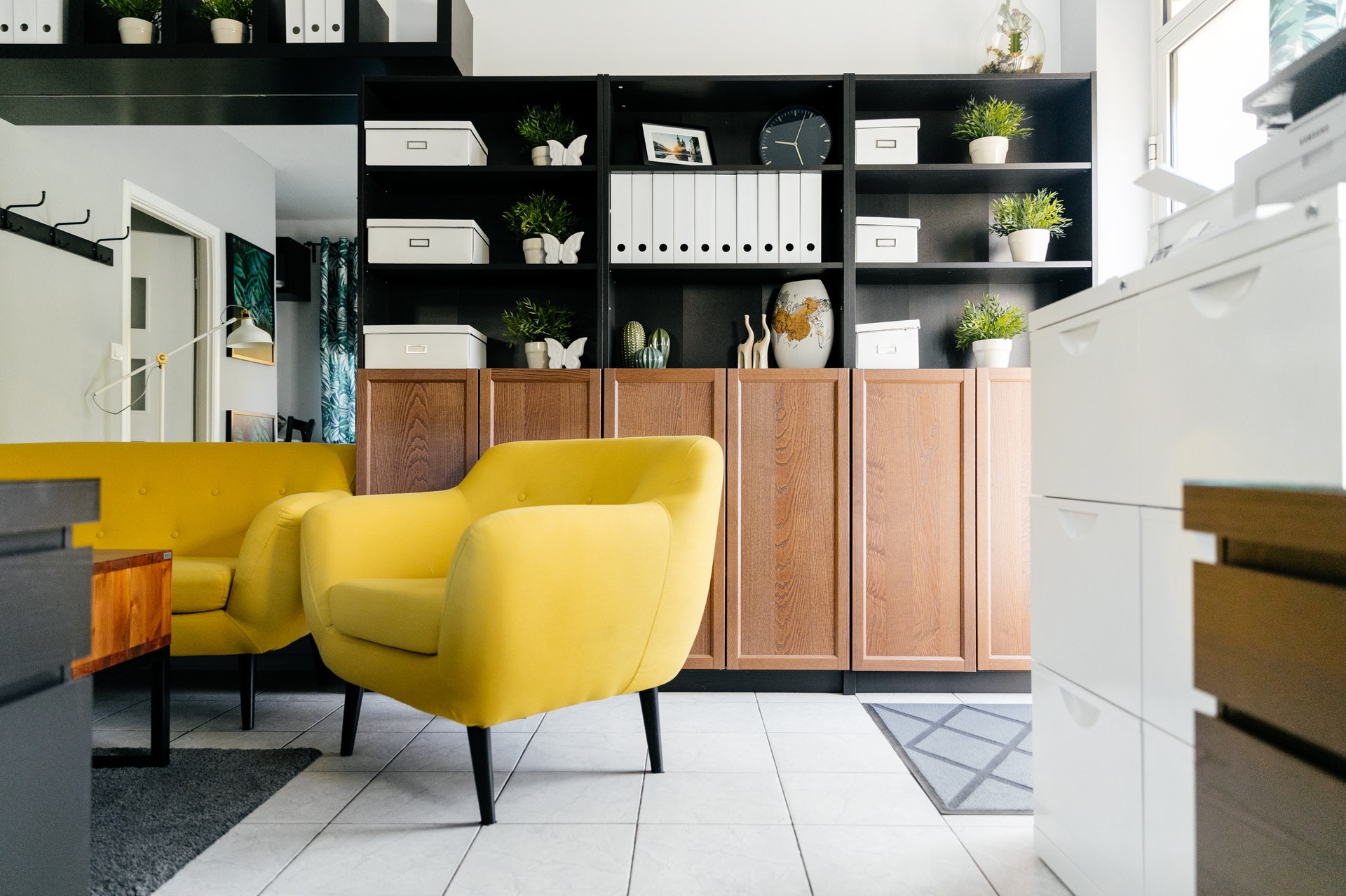 Image of yellow chairs with grey rug