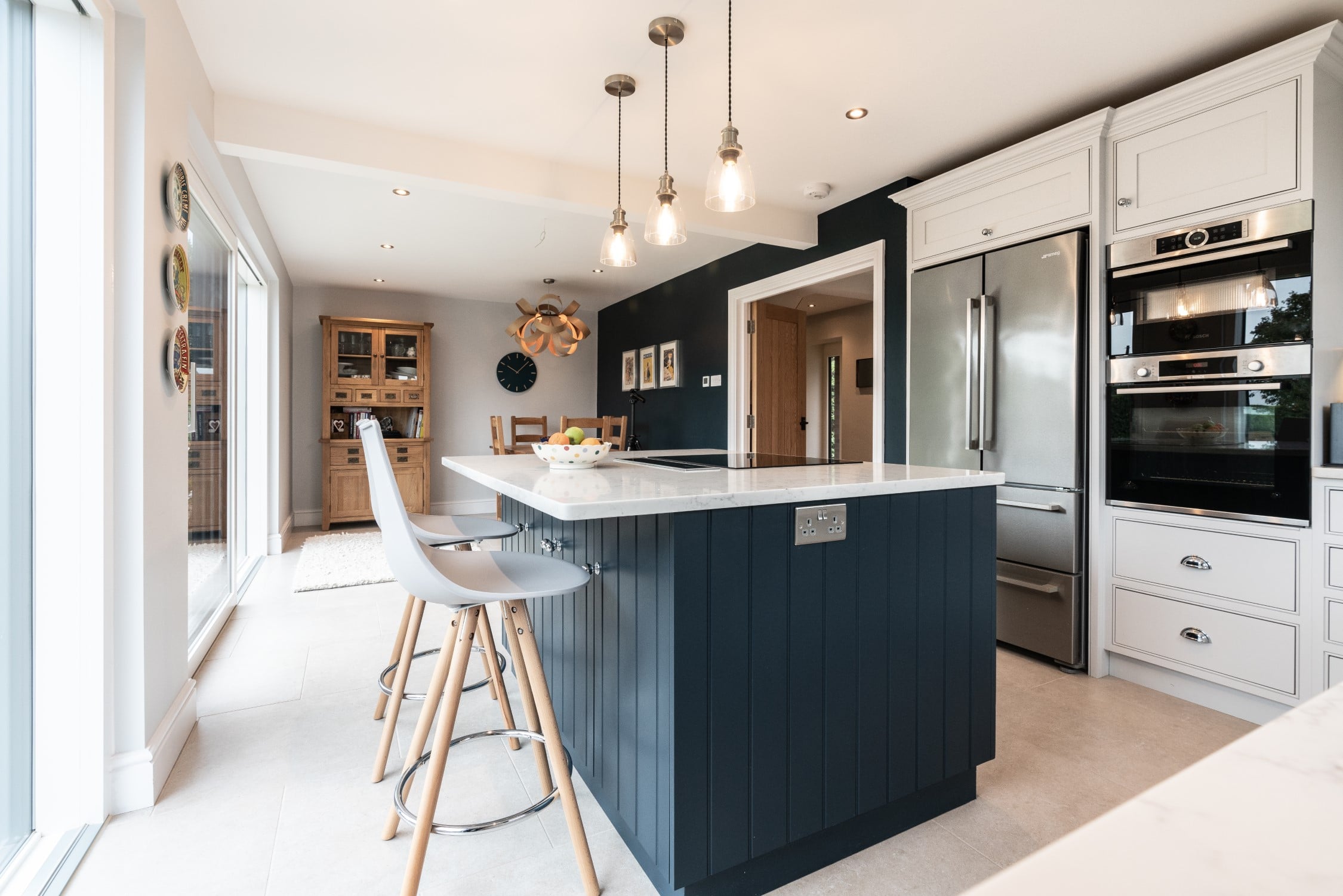 Kitchen painted in farrow and ball's hague blue and white