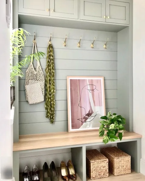 Boot room or mud room painted in Pigeon by Farrow and Ball