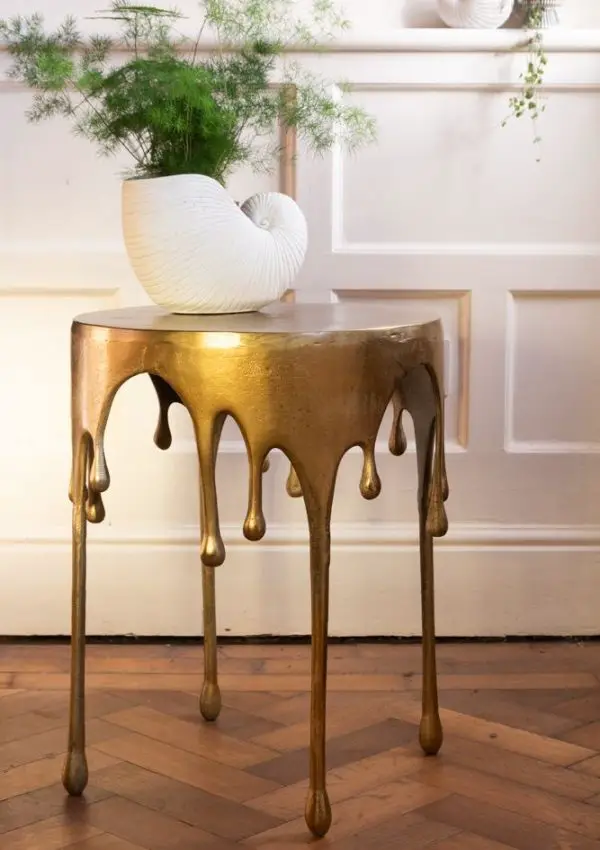 Quirky gold drip bedside table