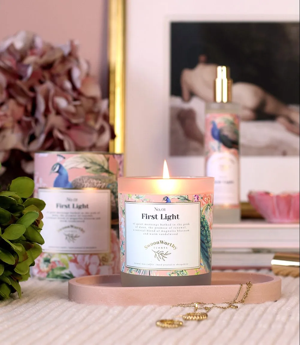 Candle burning with a scent to make your house smell like a hotel