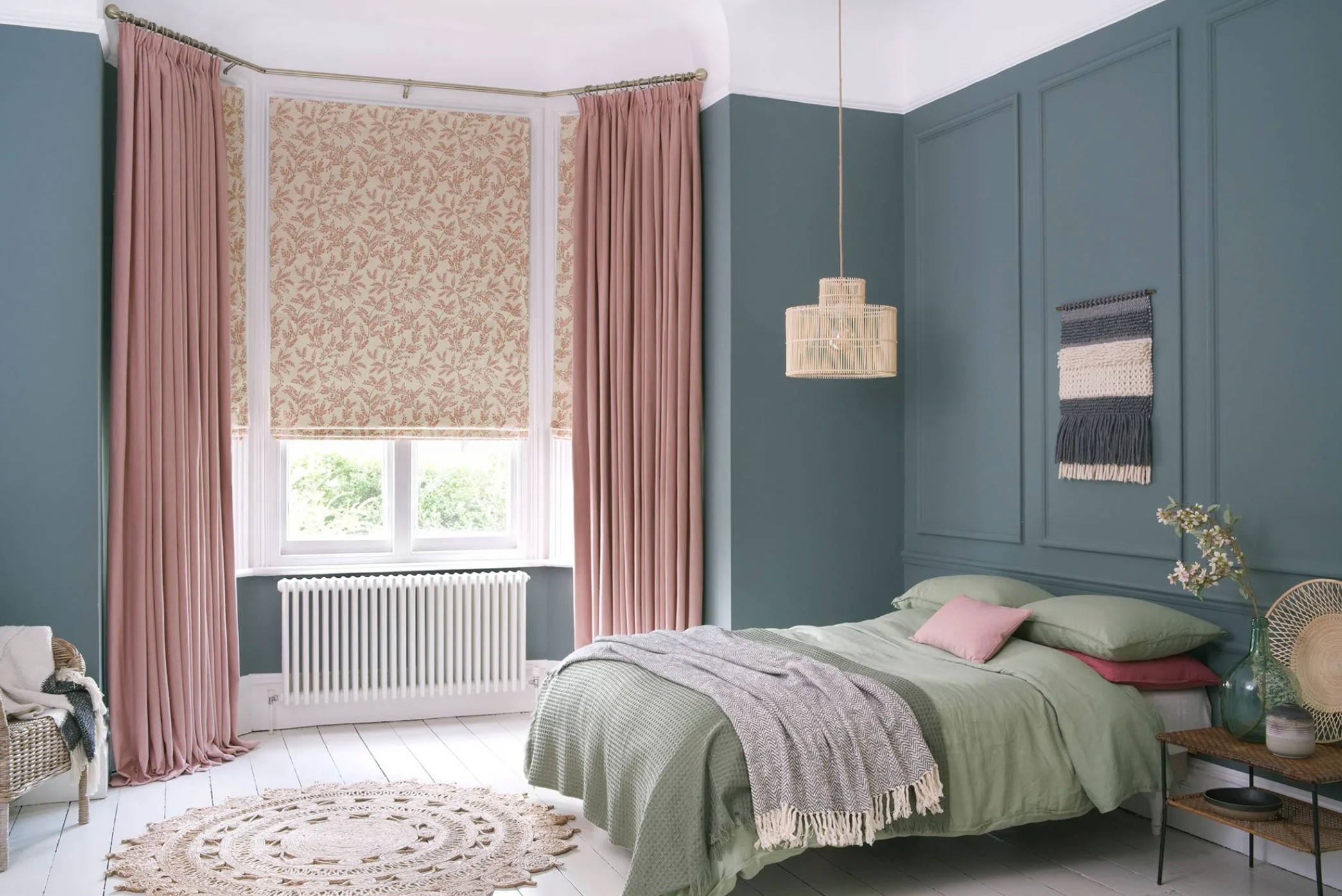 Blush pink curtains for dark blue walls