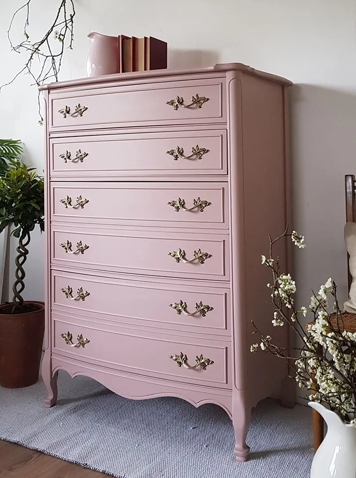 A tall chest of drawers painted in Frenchic Dusty Blush