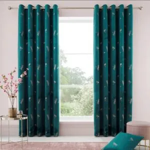 Teal curtains with light pink walls