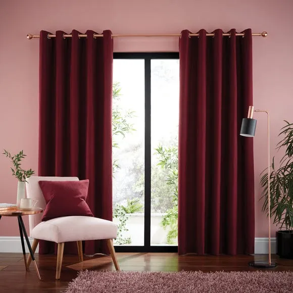 Red curtains with pink walls