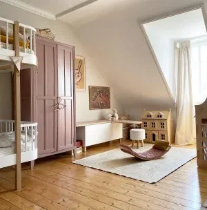 Parisian armoire painted in sulking room pink by farrow and ball