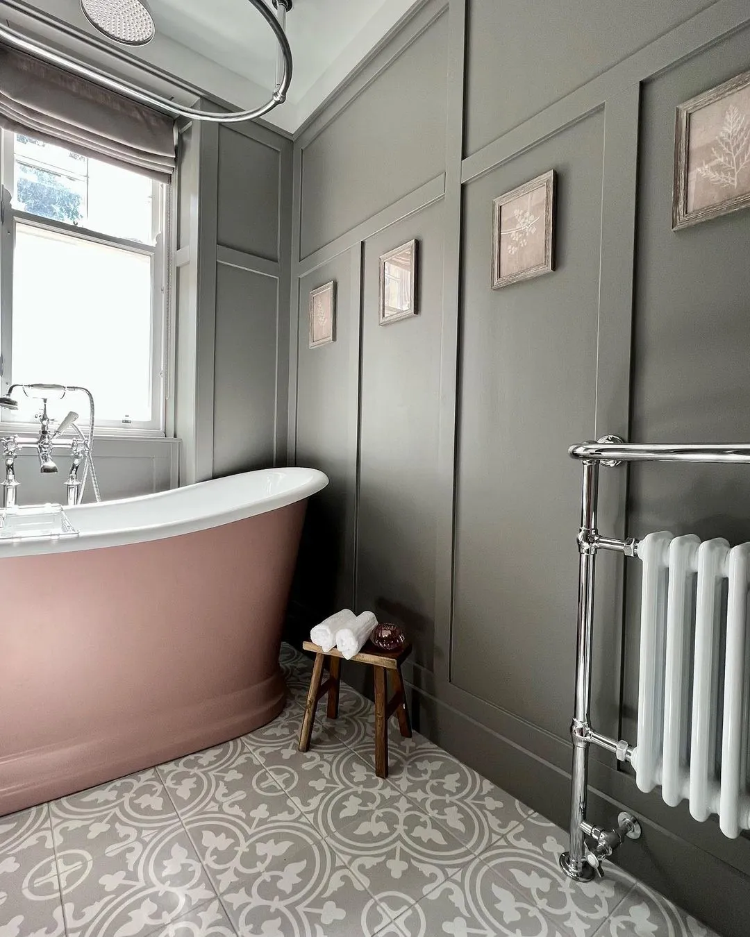 Traditional bathroom with rolltop bath painted in sulking room pink and walls painted in moles breath