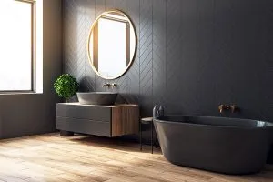 Modern black bathroom with luxury vinyl wood effect flooring by Quickstep