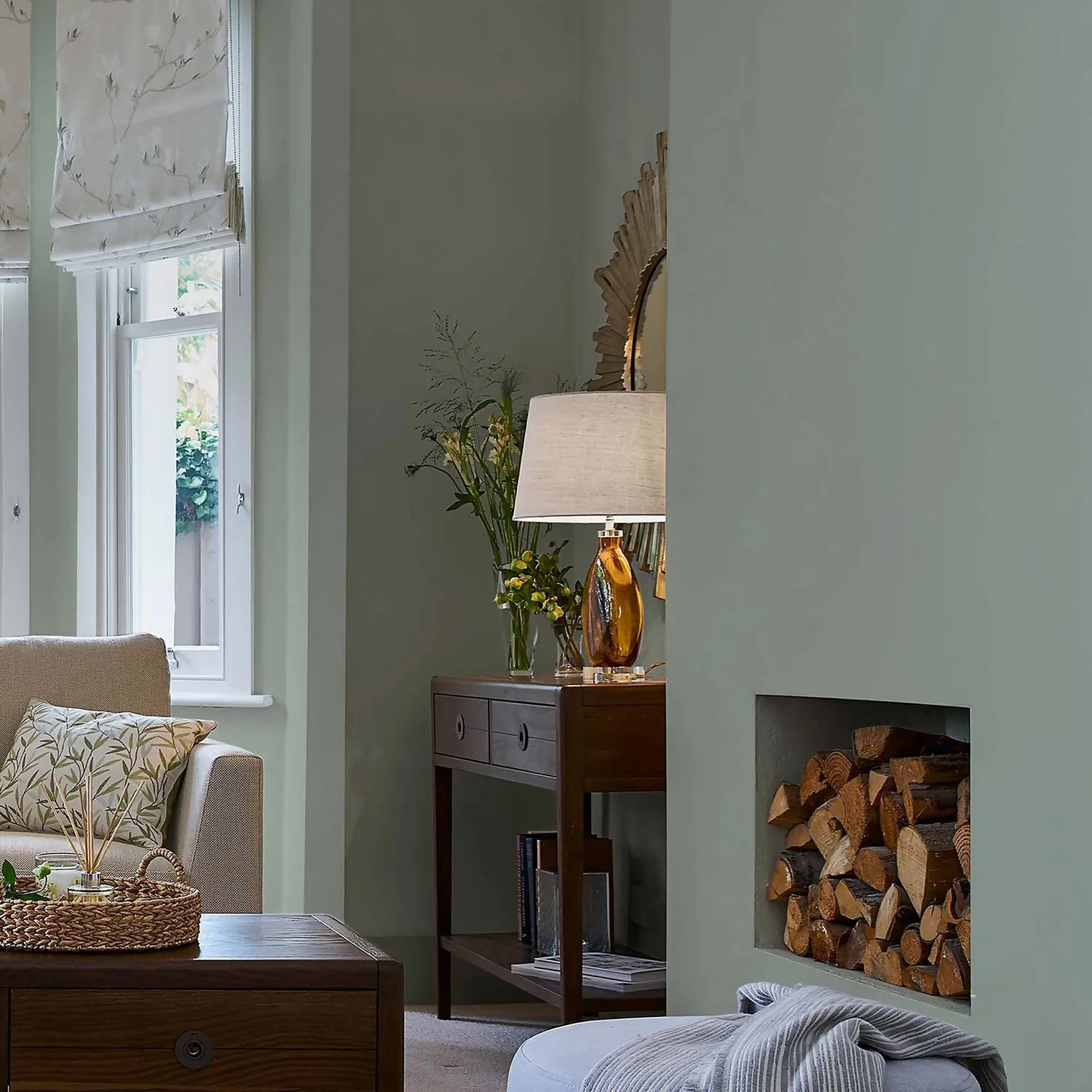 Living room painted in eau de nil paint by Laura Ashley