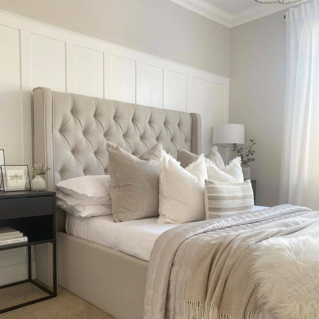 Panelled bedroom painted in ammonite by Farrow and Ball