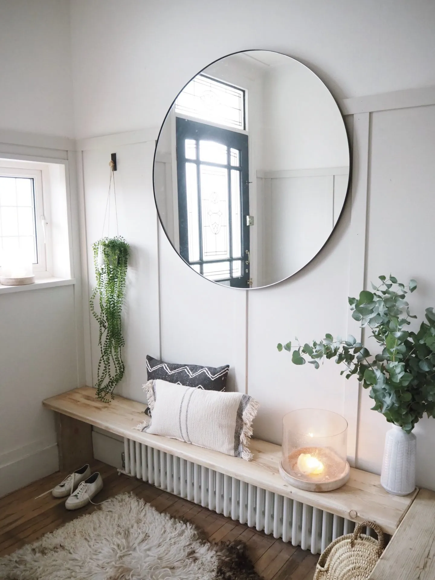 Bright hallway with panelling painted in Ammonite by Farrow and Ball