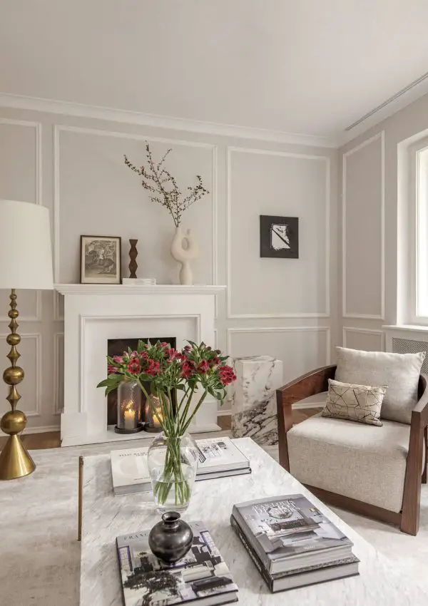 Stylish living room with panelling painted in Farrow and Ball Ammonite