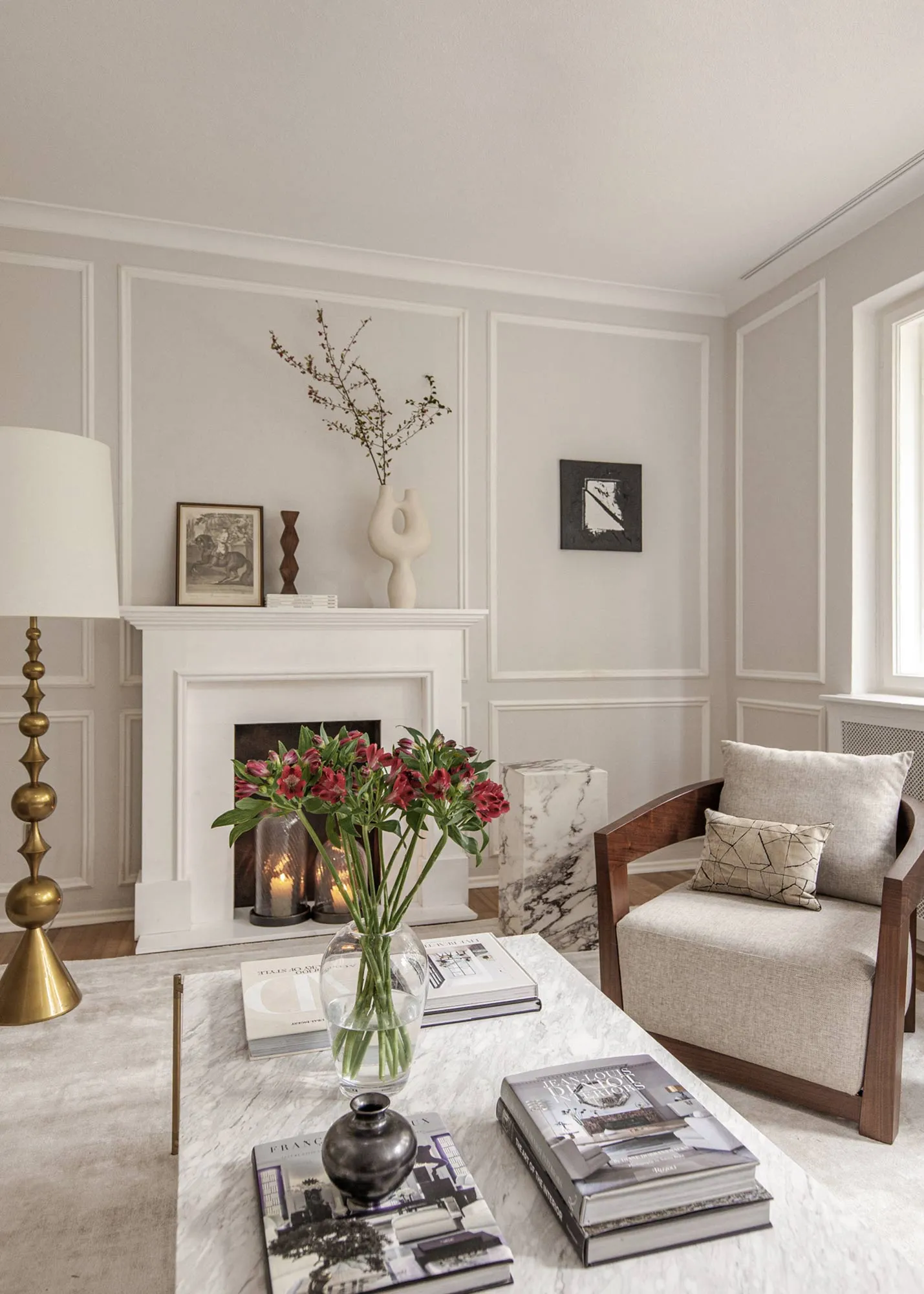 Stylish living room with panelling painted in Farrow and Ball Ammonite