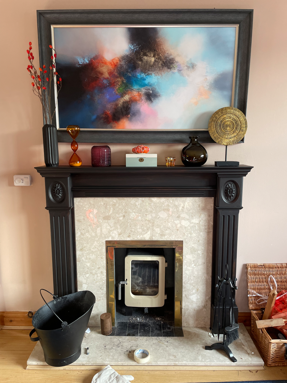 A fireplace mantelpiece surround painted in one coat of Loof by Frenchic.