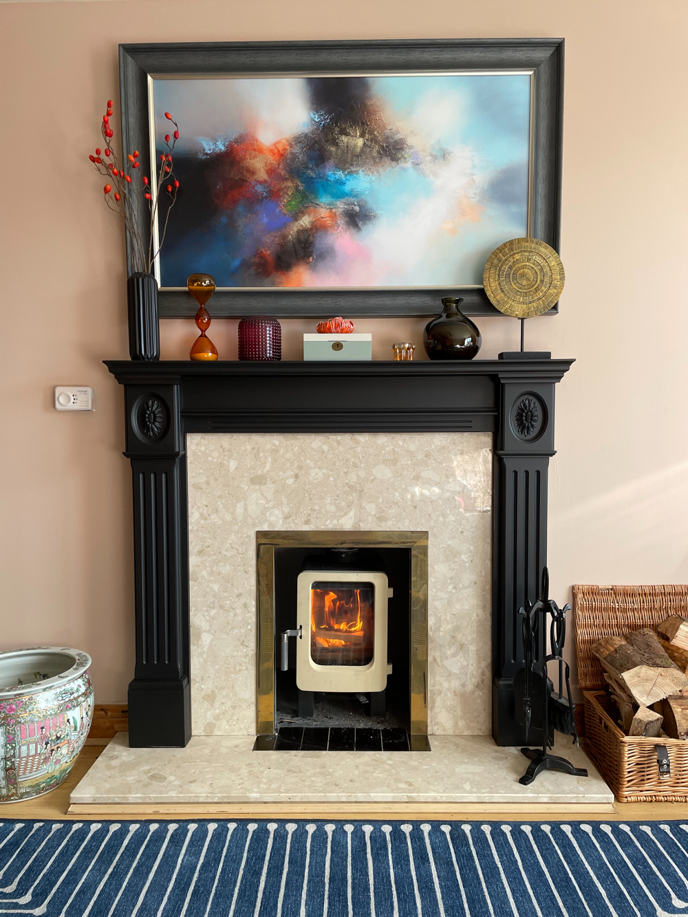 Living room painted in Setting plaster by Farrow and Ball, with Fireplace painted in Loof by Frenchic