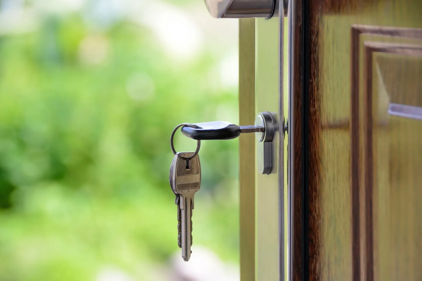 Image of a key in a front door