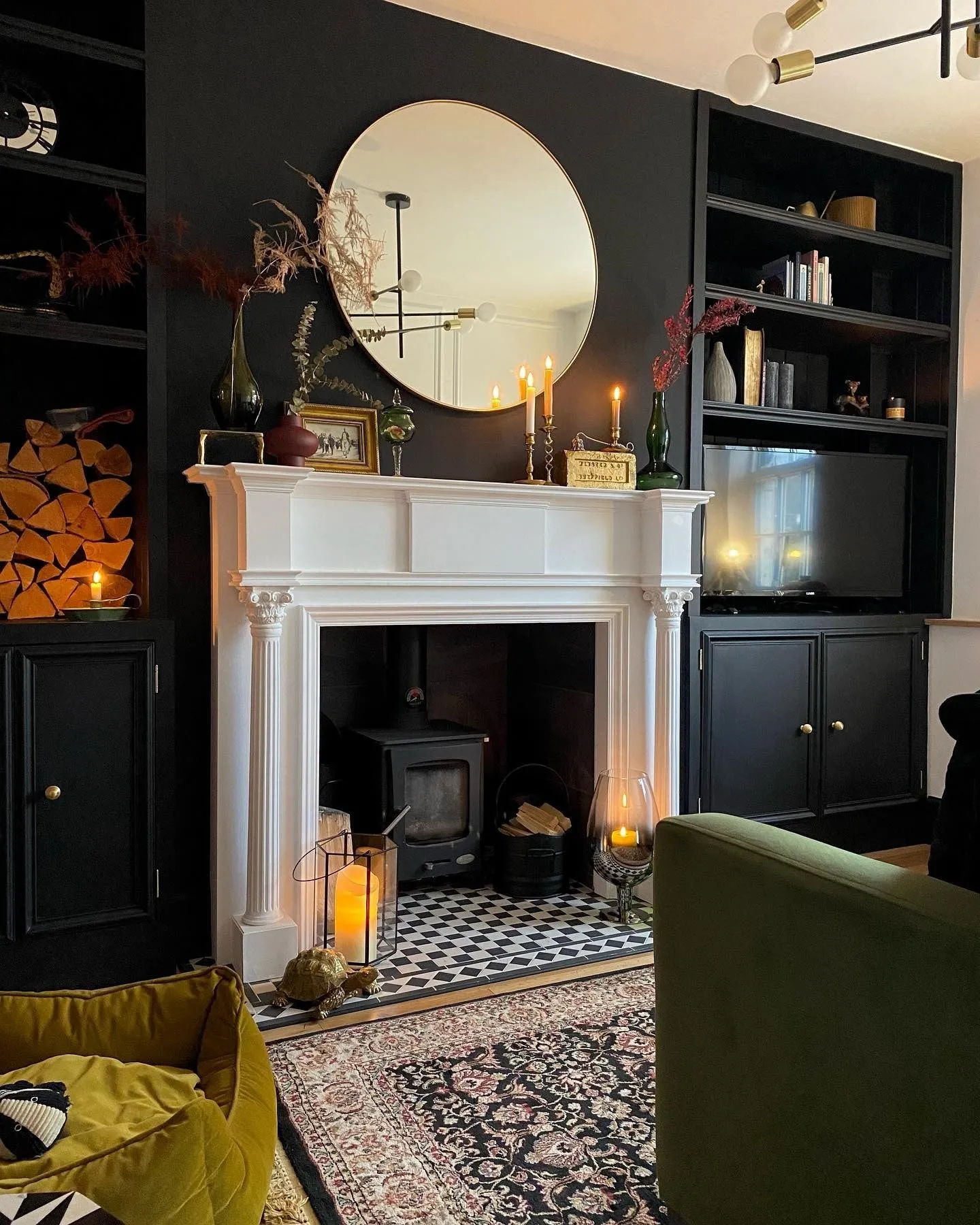Living room painted in pitch black by farrow and ball