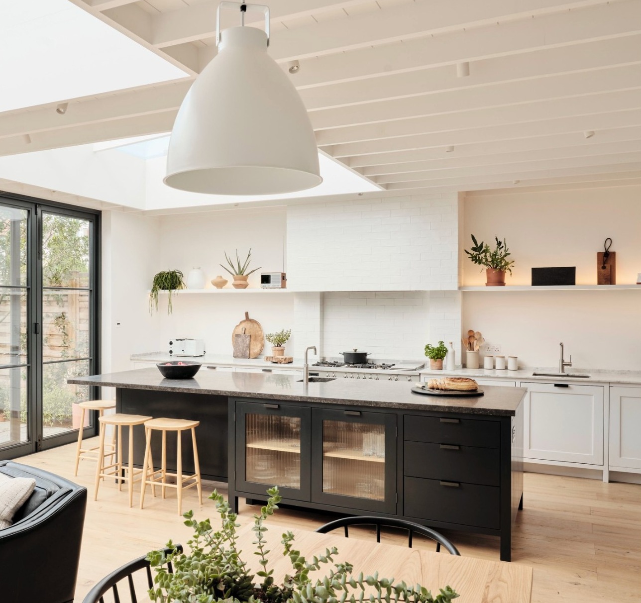 Modern kitchen with cabinets painted in Farrow and Ball Wevet