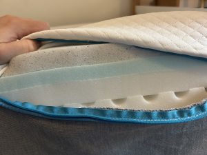 The cover of the simba mattress is unzipped showing the different layers that make up the hybrid mattress.